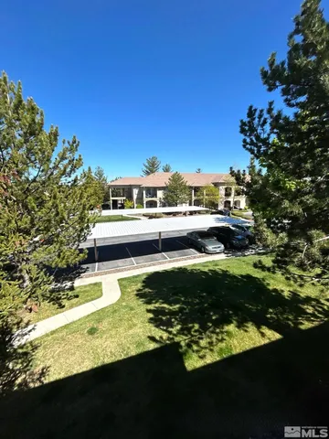 a view of swimming pool from a yard