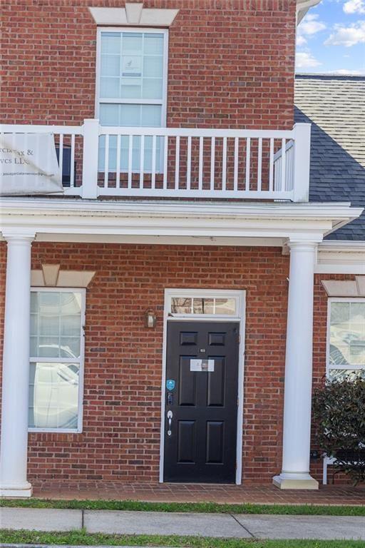 3440 Blue Springs Road, Unit 103 Kennesaw, GA 30144 - Photo 2 of 12 a front view of a building