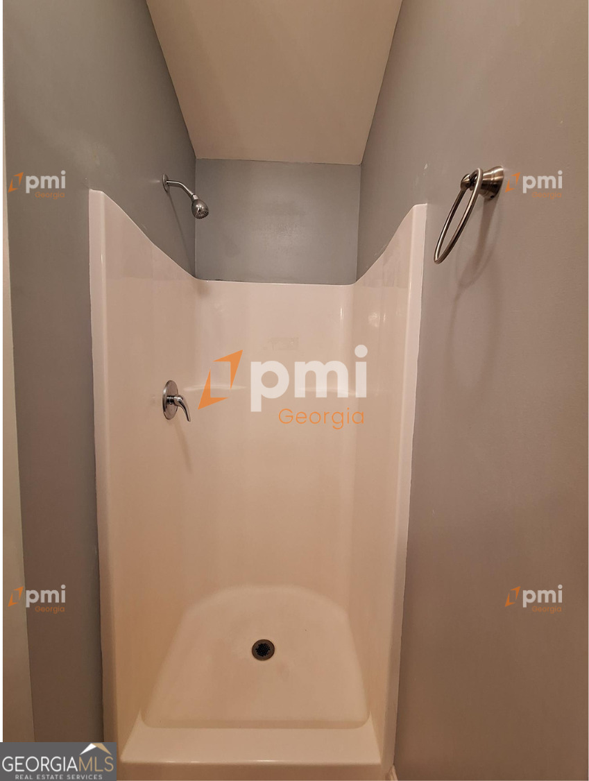 2449 Boulder Road Southeast Atlanta, GA 30316 - Photo 19 of 21 a bathroom with a shower