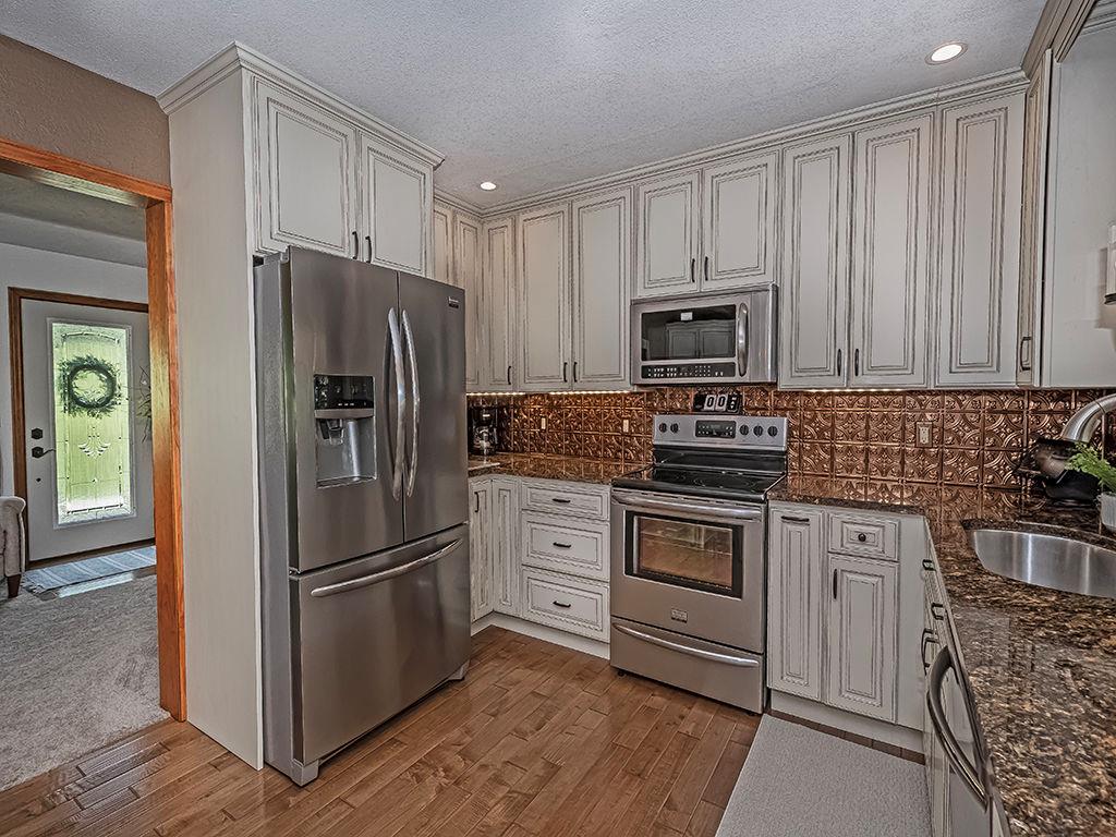 638 Knoll Lane Apollo, PA 15613 - Photo 5 of 30 a kitchen with cabinets stainless steel appliances and a counter space