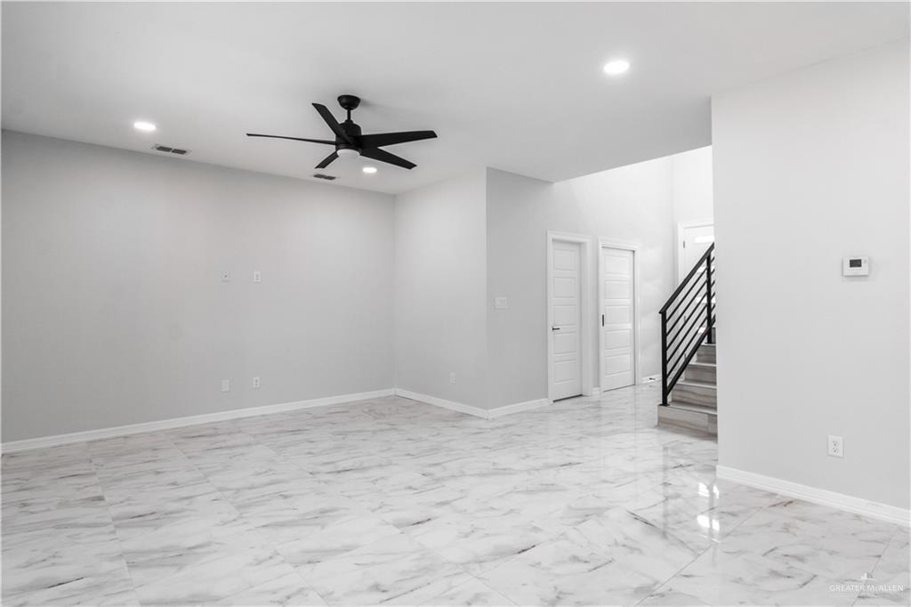 5318 North Crown Point Pharr, TX 78577 - Photo 6 of 6 Empty room with ceiling fan