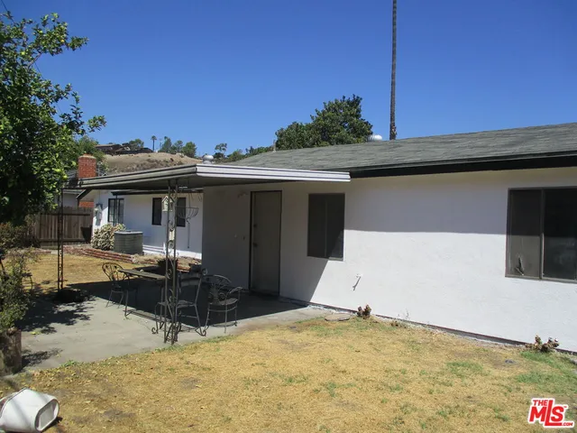 a view of a house with a patio
