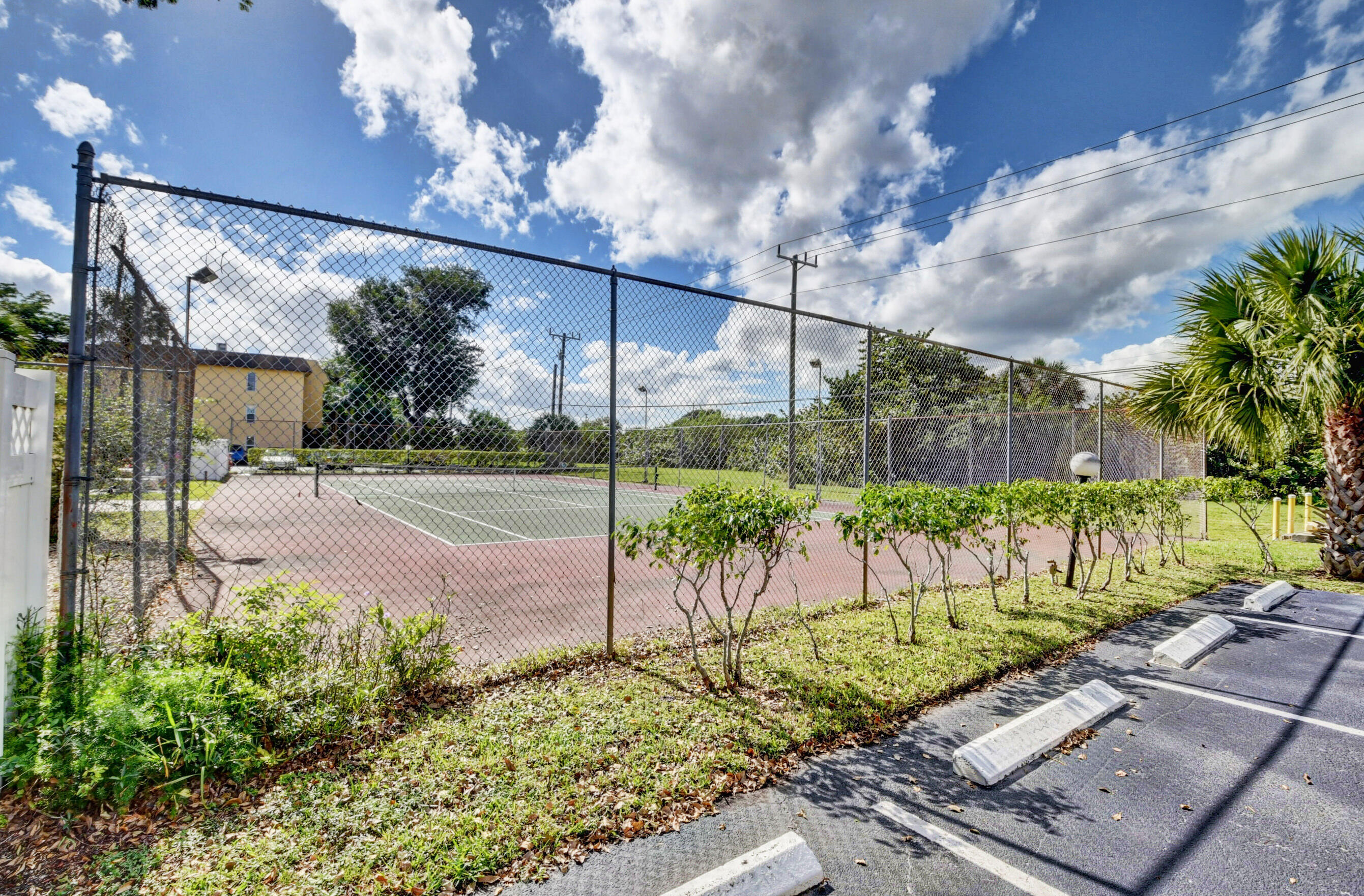 450 Northwest 20th Street, Unit 106 Boca Raton, FL 33431 - Photo 24 of 24 TENNIS COURT