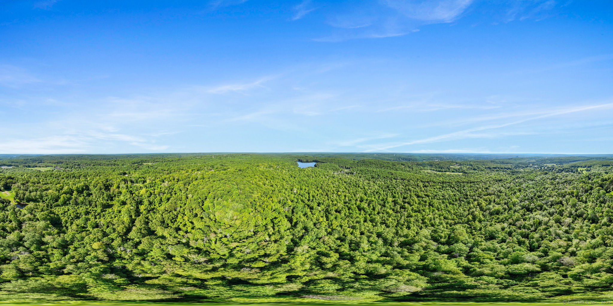 63 Velgouse Road Montville, CT 06370 - Photo 20 of 21 a view of a green field