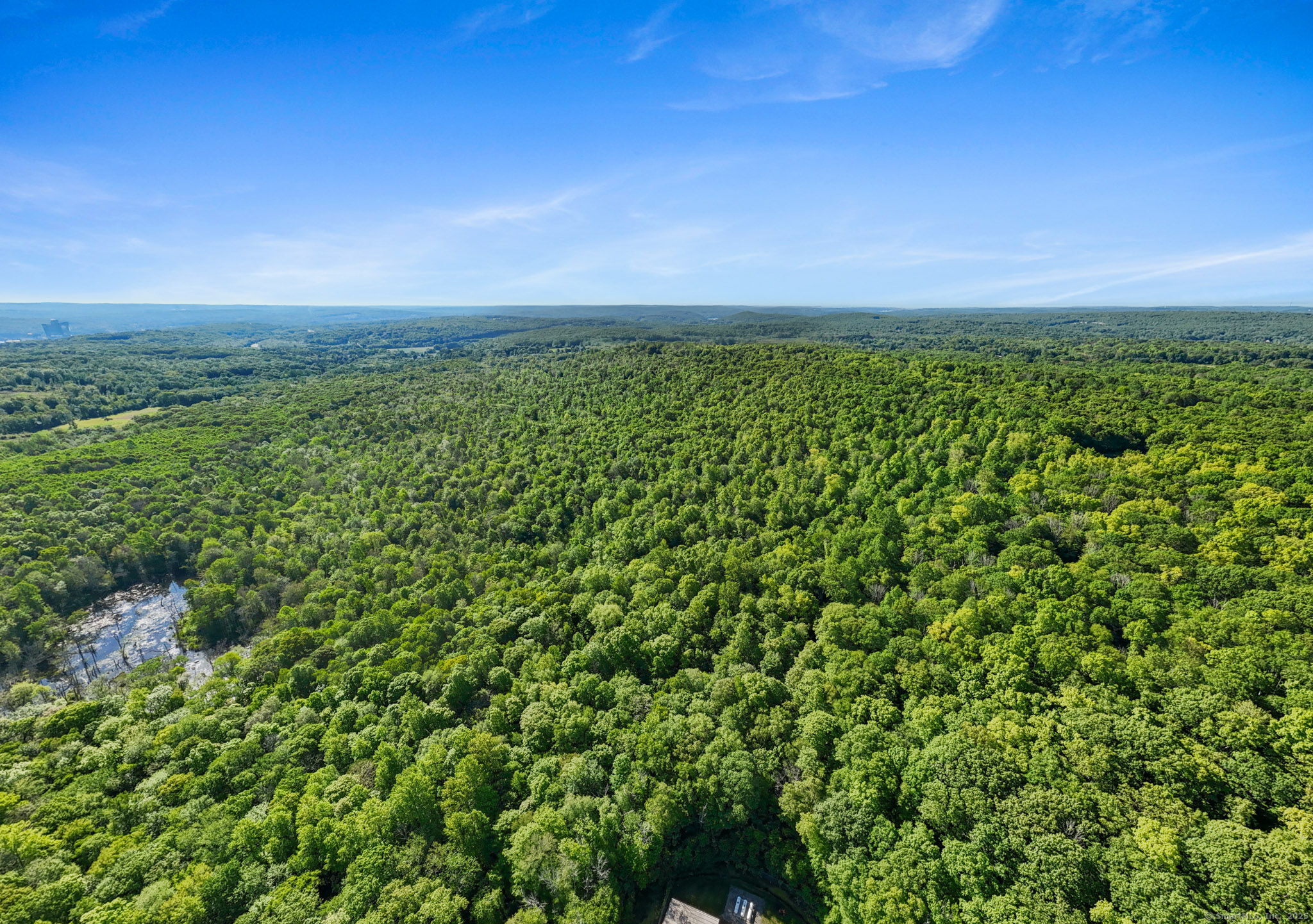 63 Velgouse Road Montville, CT 06370 - Photo 5 of 21 a view of a large yard with lots of green space
