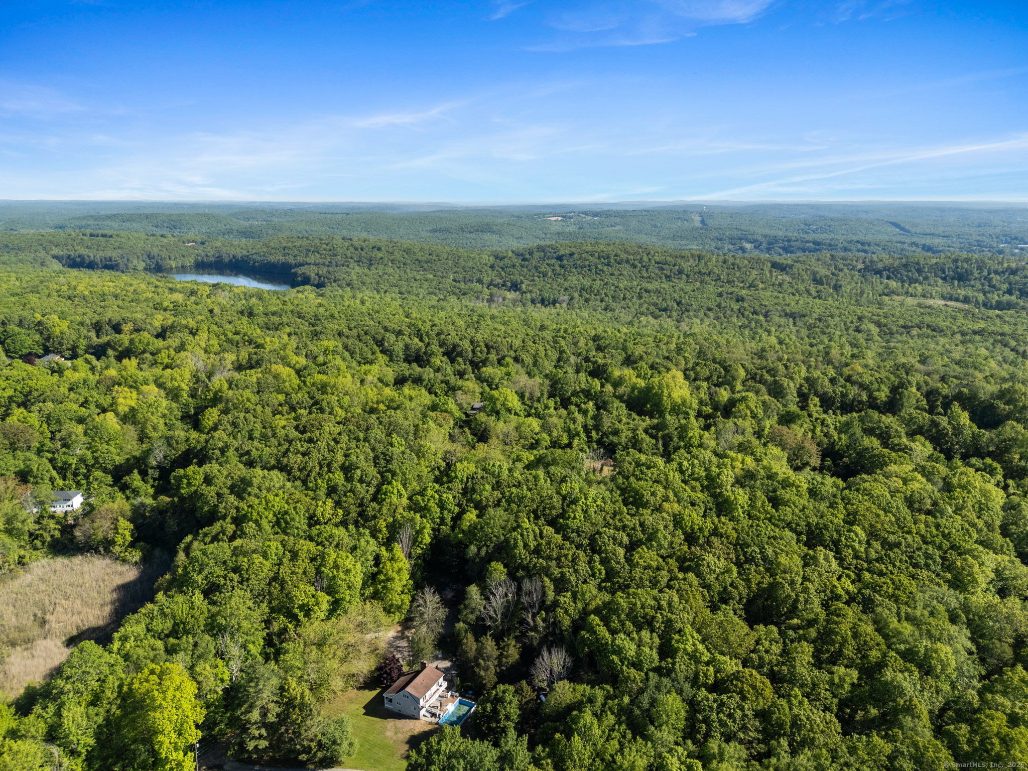 63 Velgouse Road Montville, CT 06370 - Photo 10 of 21 view of a green field with lots of bushes