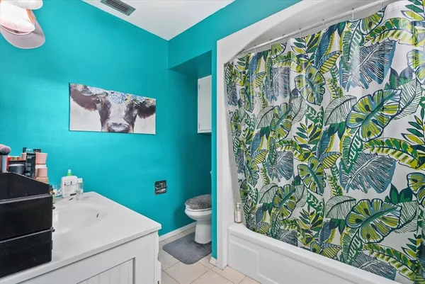 a kitchen with stainless steel appliances granite countertop a sink a stove and cabinets