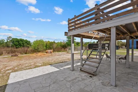 a view of a house with a back yard
