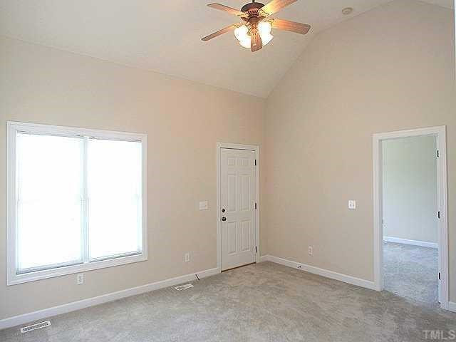 1900 Johnston County Road Benson, NC 27504 - Photo 3 of 9 Cozy Family Room with Vaulted Ceilings and Ceiling Fan. Den/Family/Great Room