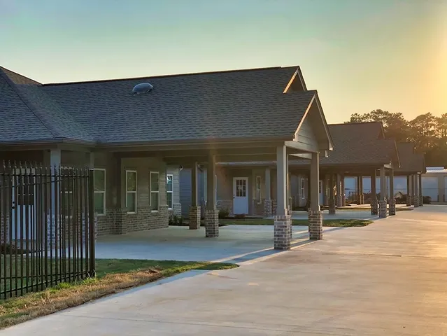 a backyard of a house with seating space