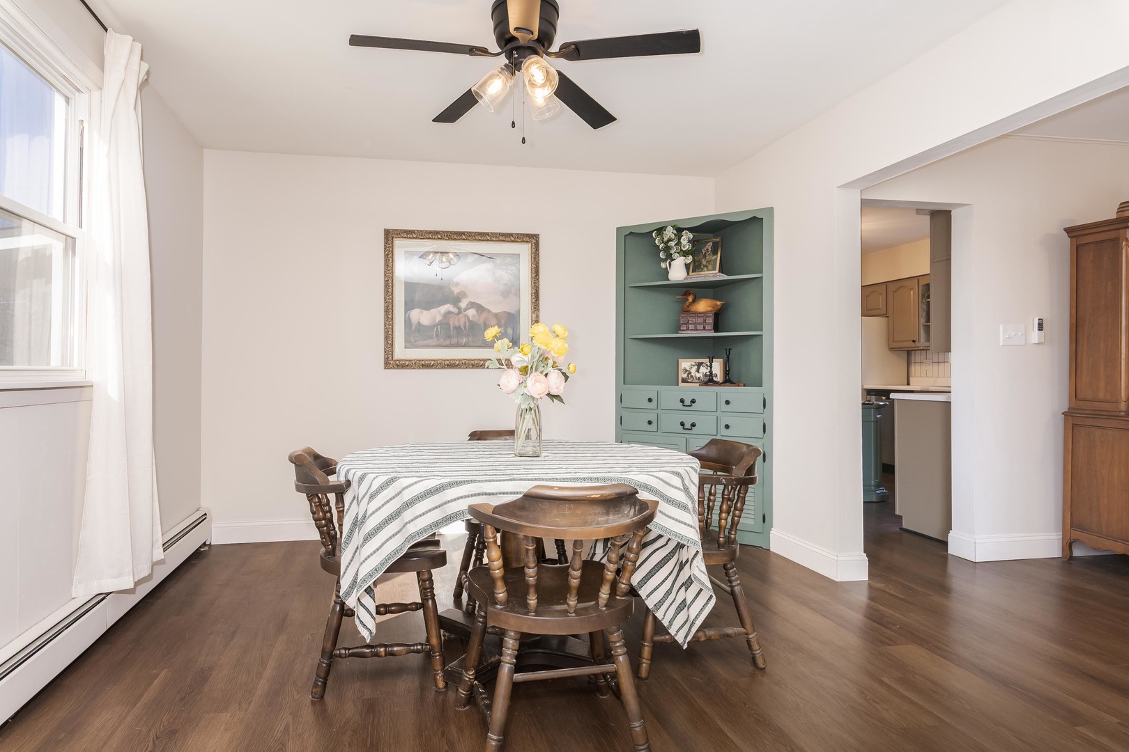 309 North Oak Street Toluca, IL 61369 - Photo 11 of 69 a view of a dining room with furniture and wooden floor