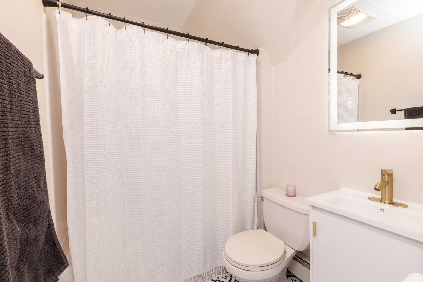 309 North Oak Street Toluca, IL 61369 - Photo 14 of 69 a white toilet sitting next to a bathroom sink