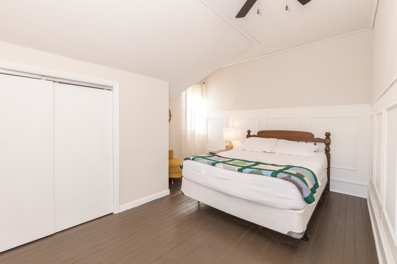 309 North Oak Street Toluca, IL 61369 - Photo 31 of 69 a bedroom with a bed and wooden floor