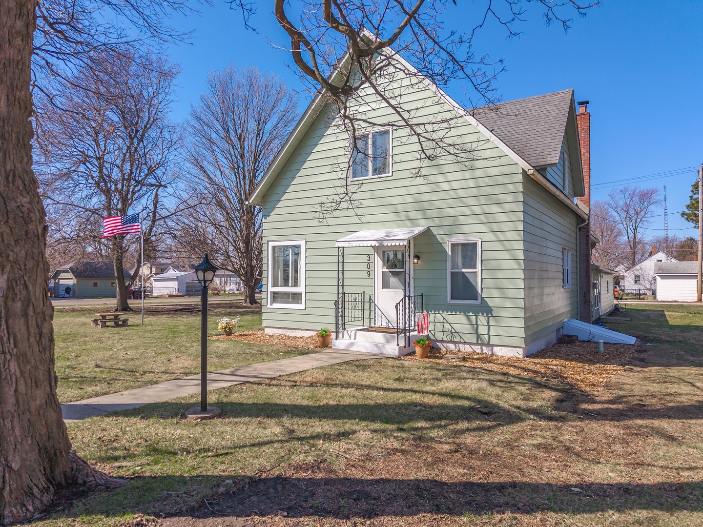 309 North Oak Street Toluca, IL 61369 - Photo 47 of 69 a view of a house with a yard
