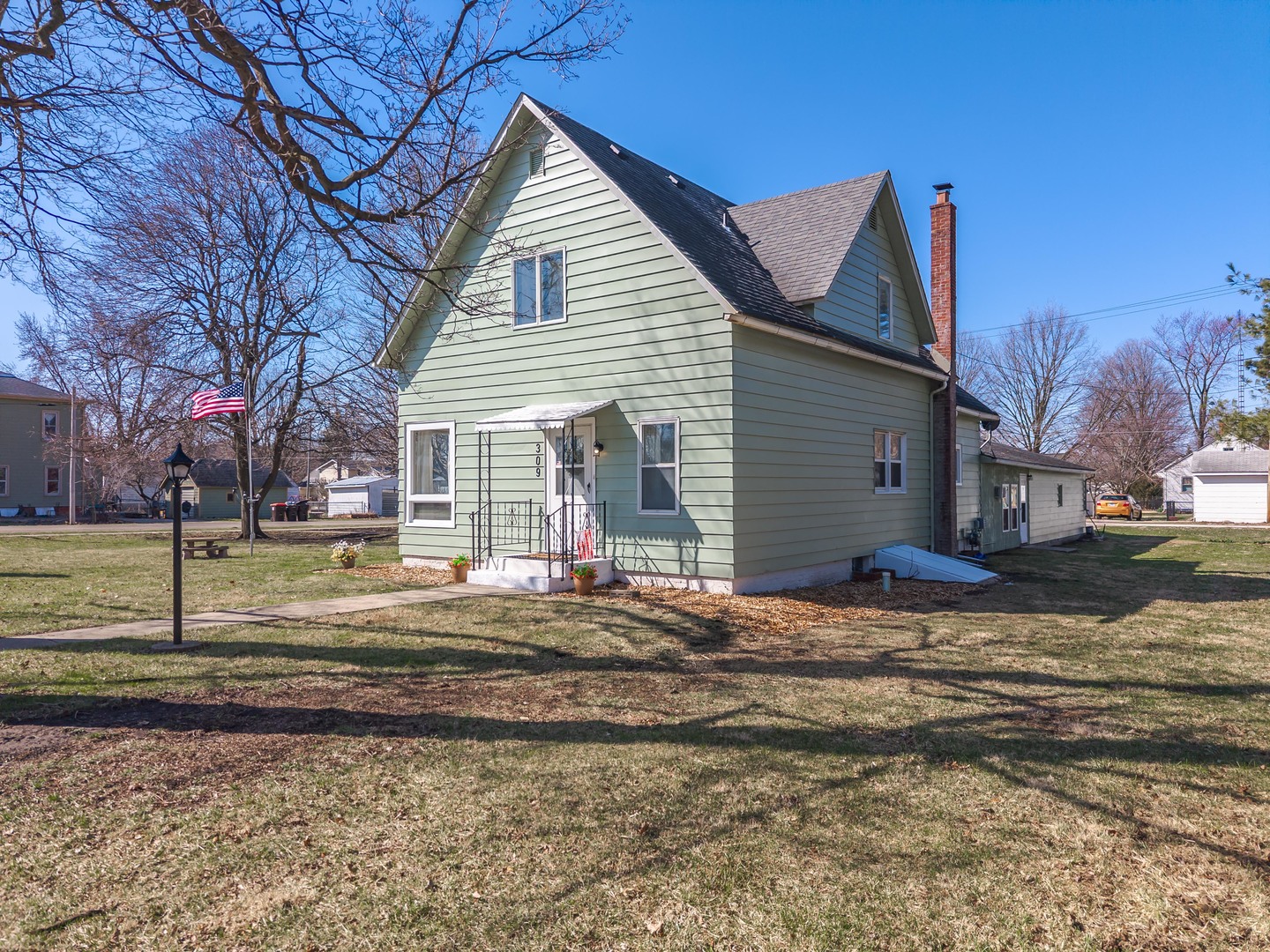 309 North Oak Street Toluca, IL 61369 - Photo 66 of 69 a view of a house with a yard and large tree
