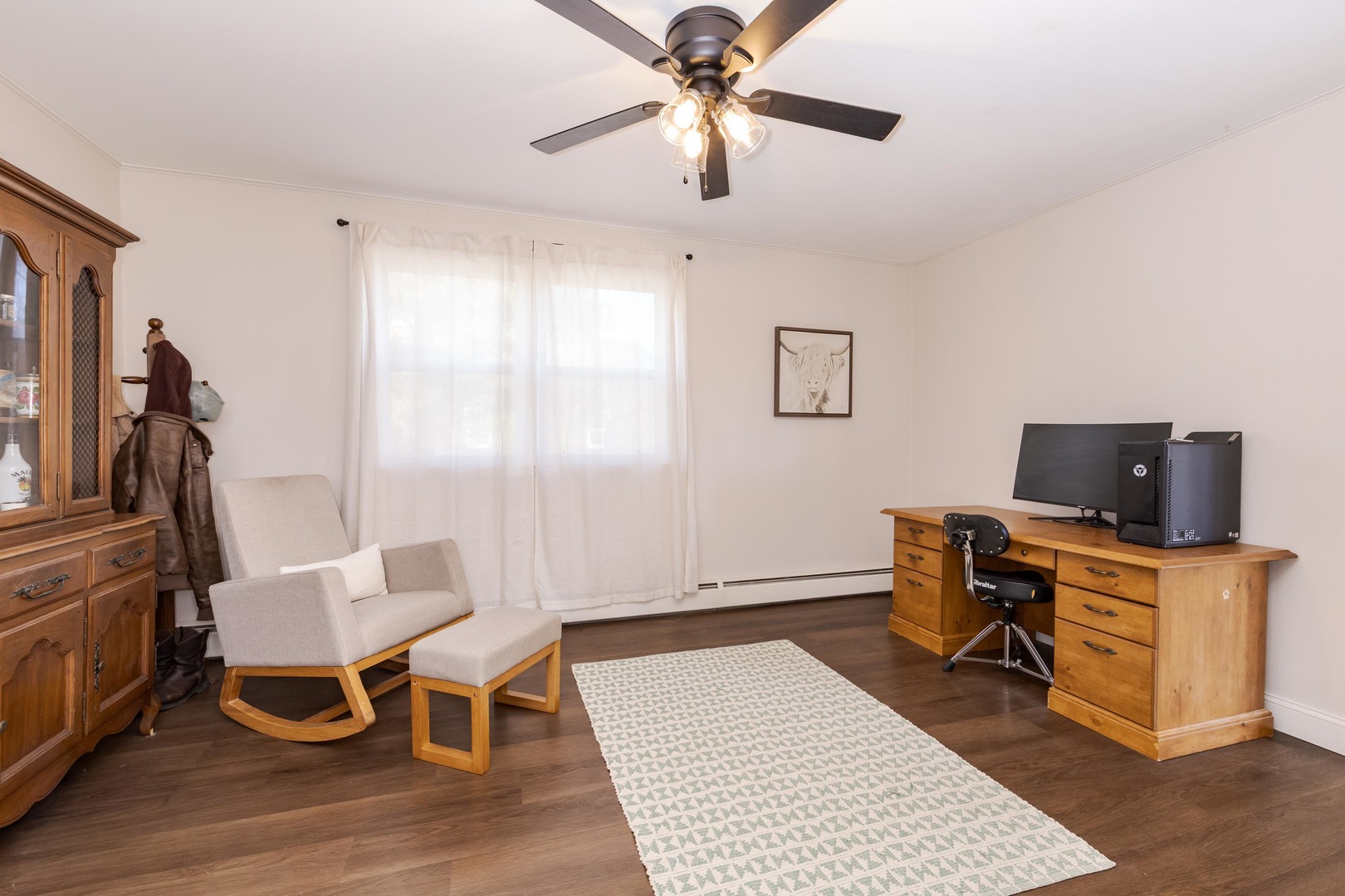 309 North Oak Street Toluca, IL 61369 - Photo 10 of 69 a view of a workspace with furniture and a window