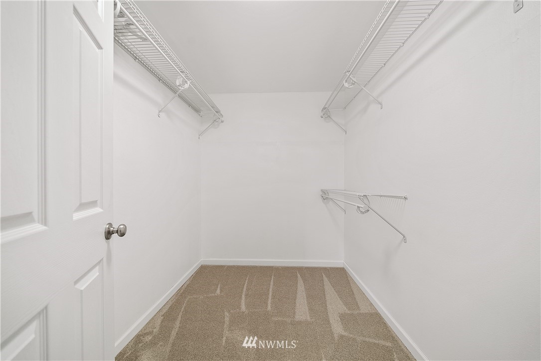 7810 196th Lane Southwest Rochester, WA 98579 - Photo 14 of 36 a view of a room with racks on the wall