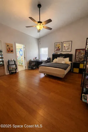 a bedroom with a bed and furniture