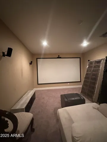 a kitchen with a sink a counter top space stainless steel appliances and cabinets