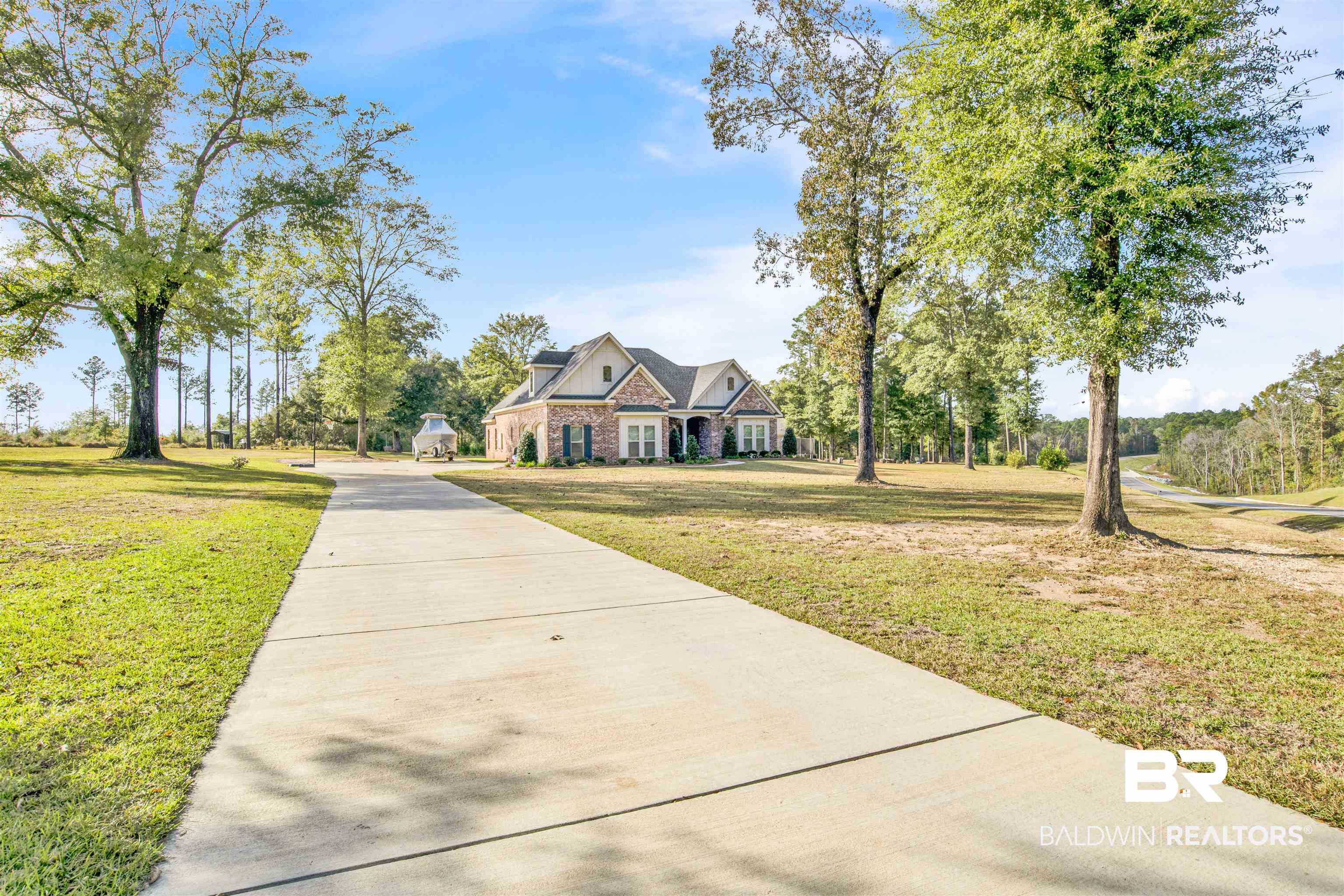 2440 Johnson Road West Mobile, AL 36695 - Photo 7 of 40 View of front of property featuring a front lawn