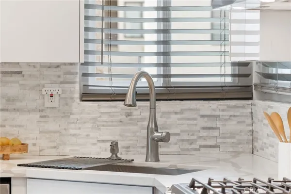 a bathroom with a sink and a shower