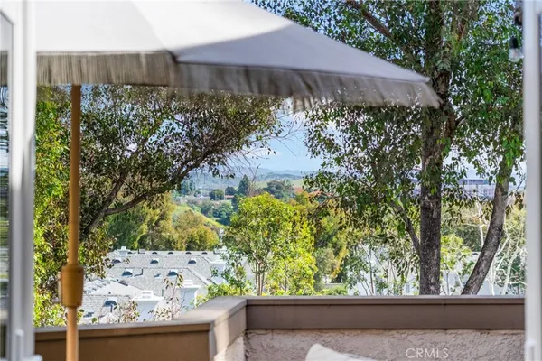 a view of a backyard of the house