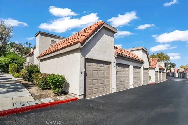 a view of a house with a garage