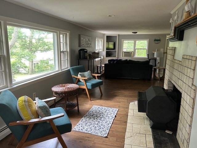 a living room with furniture and a window