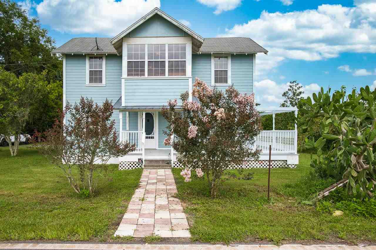 9095 Reid Packing House Road Hastings, FL 32145 - Photo 1 of 50 a front view of a house with a yard