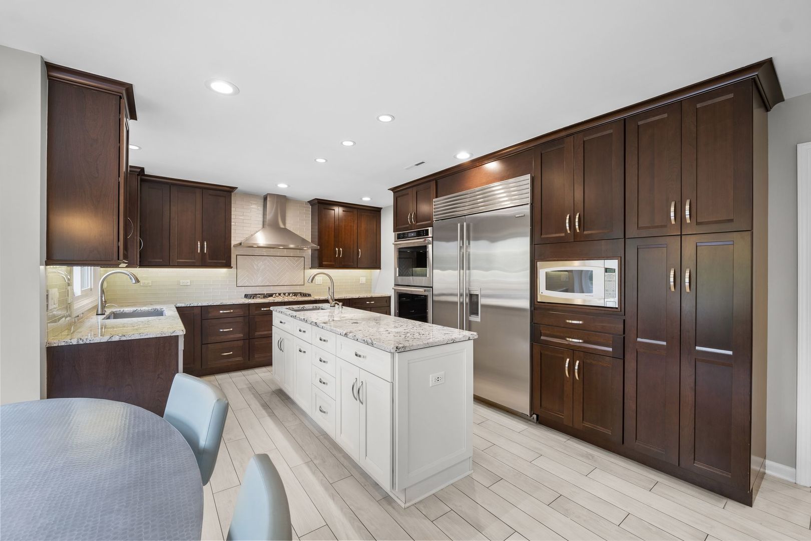 3130 Kayjay Drive Northbrook, IL 60062 - Photo 3 of 23 a kitchen with cabinets a refrigerator and a sink