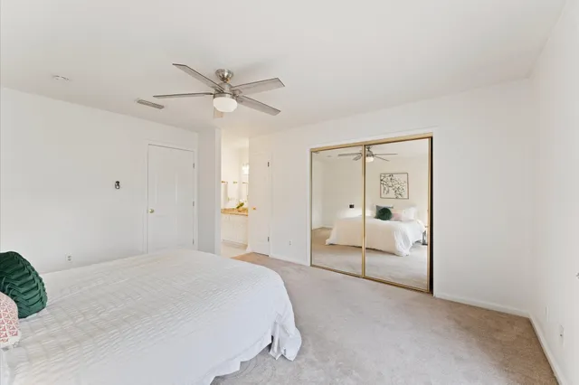 a balcony with wooden floor and fence