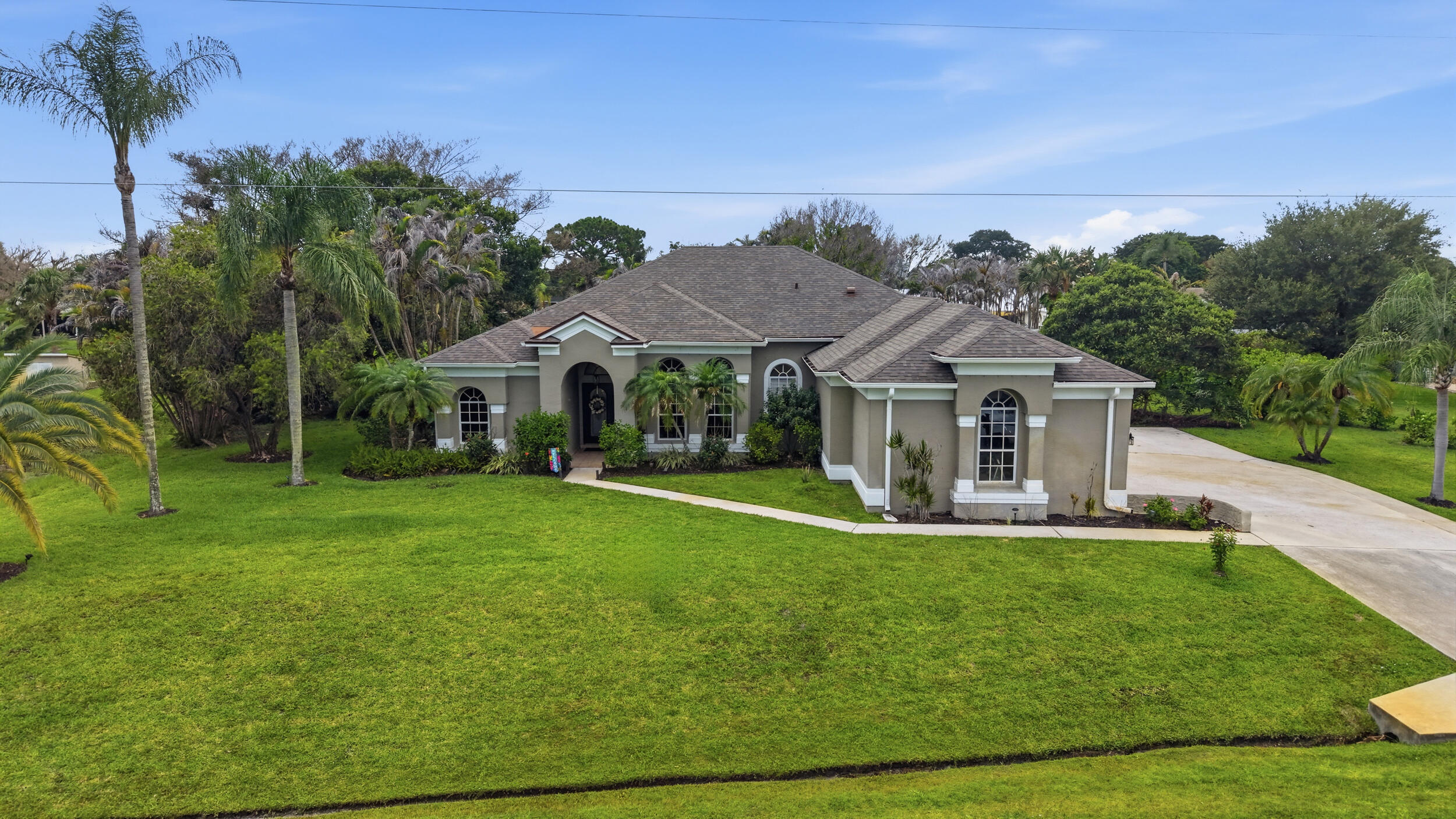 2598 Southeast Hamden Road Port St. Lucie, FL 34952 - Photo 2 of 51 52_dji_20260623052652_0194_d