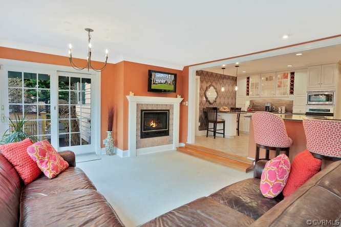 1821 Castlebridge Road Midlothian, VA 23113 - Photo 13 of 40 a living room with furniture and a fireplace