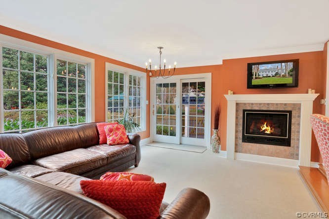 1821 Castlebridge Road Midlothian, VA 23113 - Photo 14 of 40 a living room with furniture and a fireplace