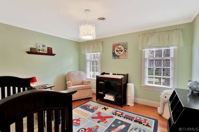 1821 Castlebridge Road Midlothian, VA 23113 - Photo 20 of 40 a living room with furniture and a window