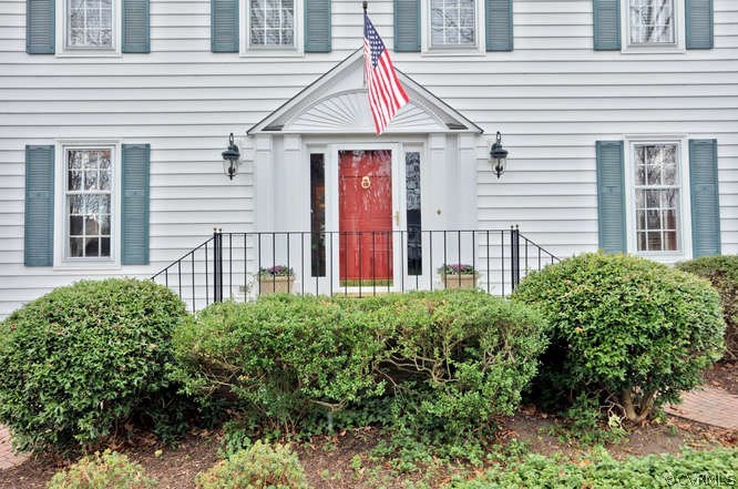1821 Castlebridge Road Midlothian, VA 23113 - Photo 2 of 40 a view of a house with large windows and flower plants
