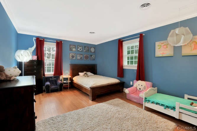 1821 Castlebridge Road Midlothian, VA 23113 - Photo 22 of 40 a bedroom with a bed and window