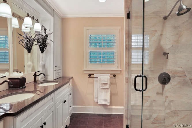 1821 Castlebridge Road Midlothian, VA 23113 - Photo 27 of 40 a bathroom with a granite countertop sink and a mirror