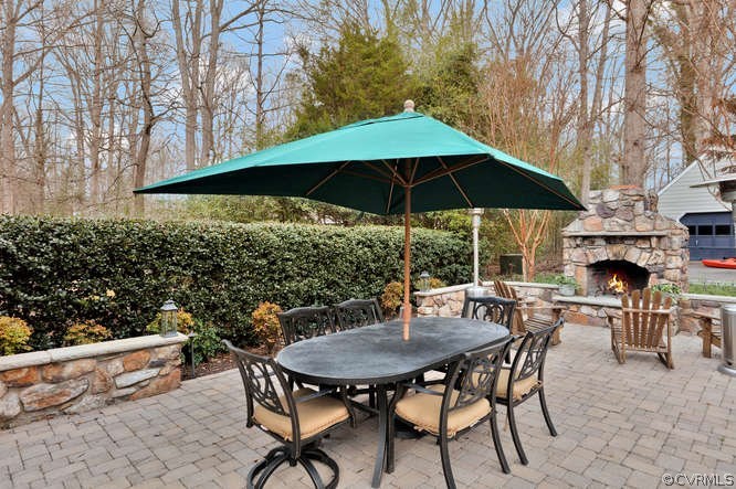 1821 Castlebridge Road Midlothian, VA 23113 - Photo 33 of 40 a view of backyard with seating space and trees