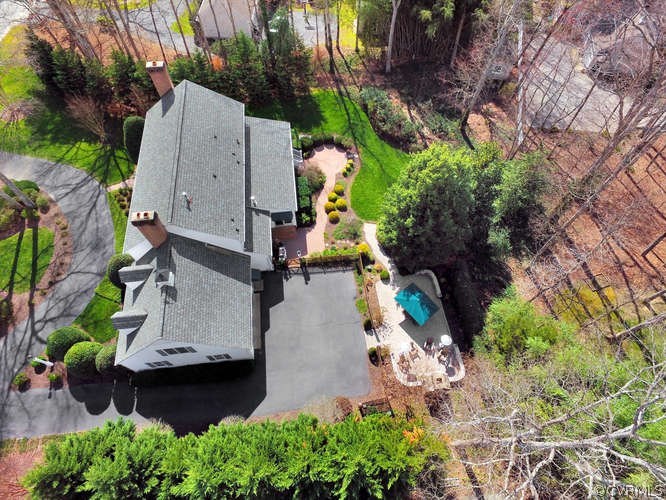 1821 Castlebridge Road Midlothian, VA 23113 - Photo 36 of 40 an aerial view of a house with a yard and a large tree