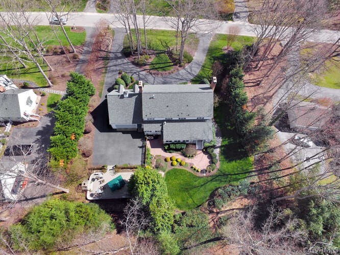1821 Castlebridge Road Midlothian, VA 23113 - Photo 39 of 40 a view of a backyard with sitting area