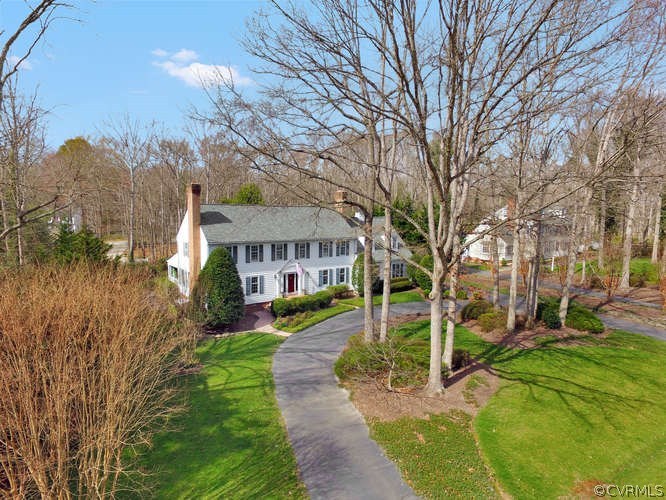 1821 Castlebridge Road Midlothian, VA 23113 - Photo 40 of 40 a front view of a house with a yard and trees