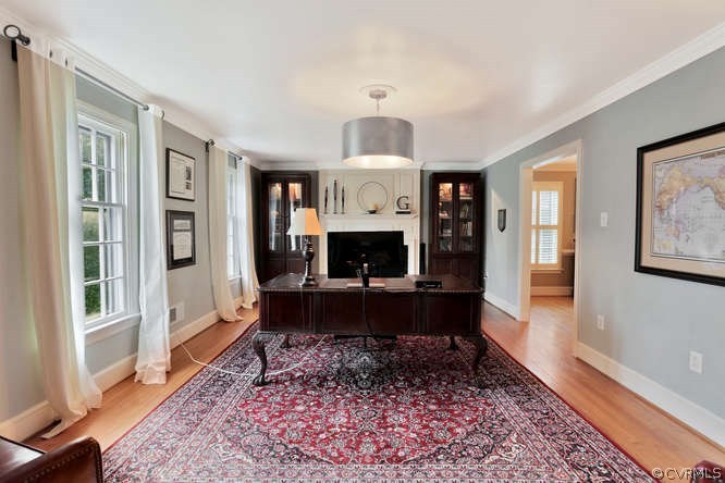1821 Castlebridge Road Midlothian, VA 23113 - Photo 4 of 40 a living room with furniture and a fireplace