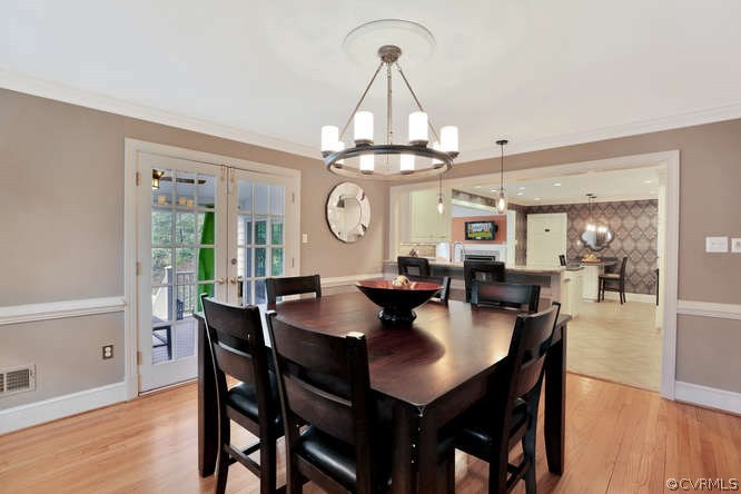 1821 Castlebridge Road Midlothian, VA 23113 - Photo 6 of 40 a view of a dining room with furniture window and wooden floor