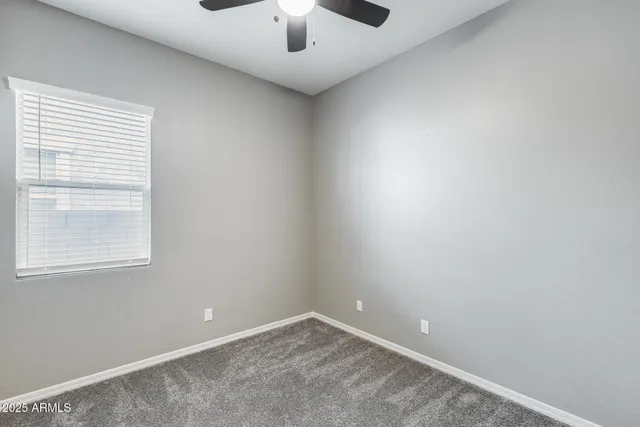 a kitchen with stainless steel appliances granite countertop a sink a stove and a wooden floors
