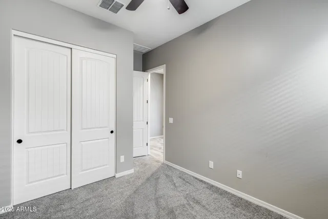 a kitchen with kitchen island granite countertop stainless steel appliances lots of counter top space cabinets and a sink