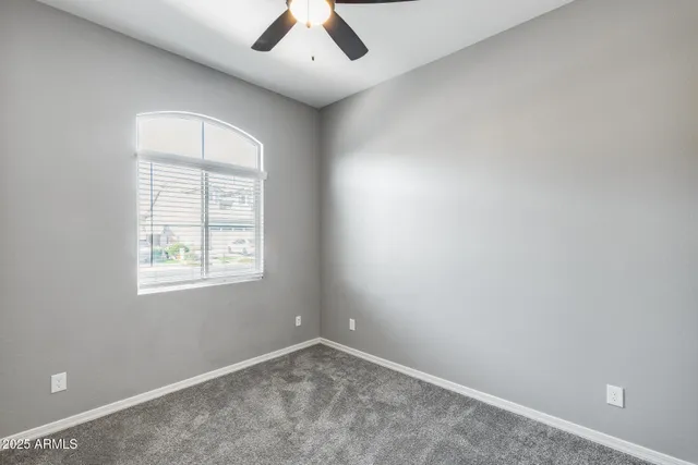 a kitchen with stainless steel appliances granite countertop a refrigerator a sink and a stove