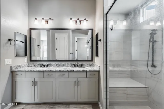 a sign that is sitting on a brick wall