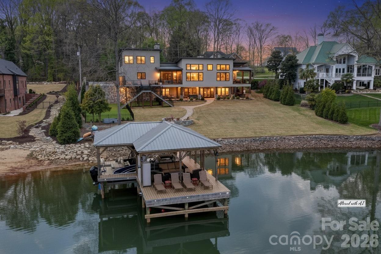 644 Normandy Road Mooresville, NC 28117 - Photo 1 of 32 a view of houses with outdoor space and lake view