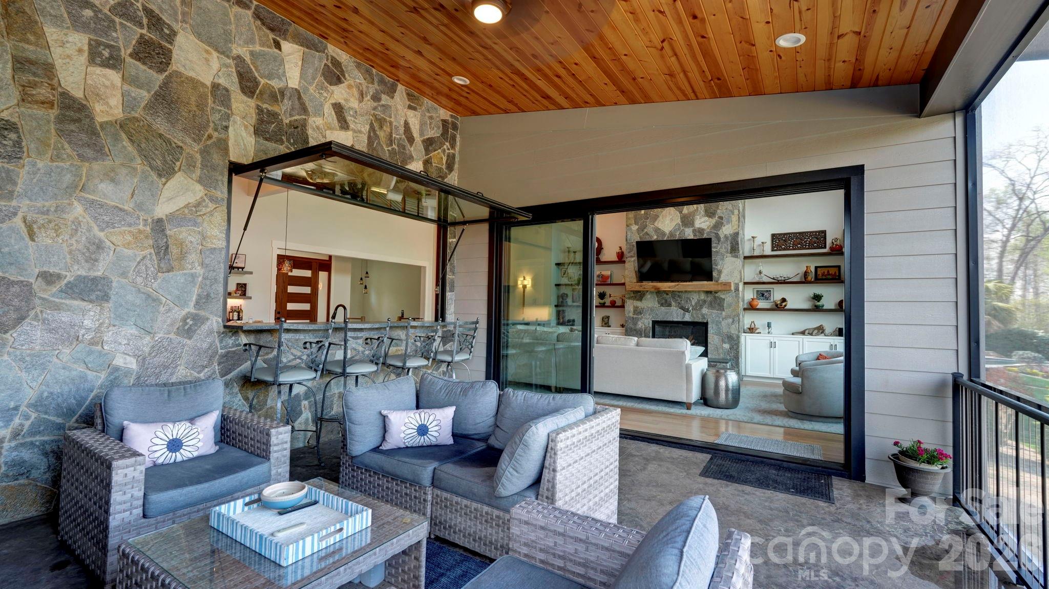 644 Normandy Road Mooresville, NC 28117 - Photo 11 of 32 a living room with furniture and a fireplace